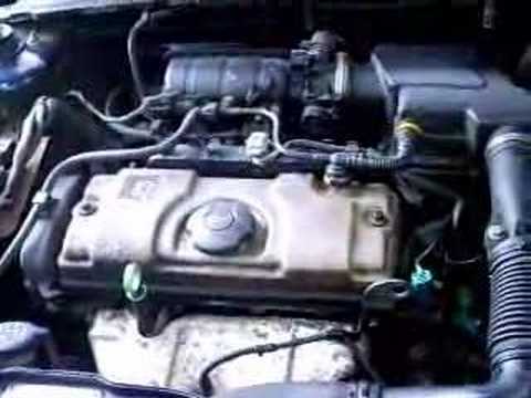 Peugeot 106 service by oil and filter change with flush