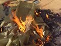 Nylon raincoat in a bonfire