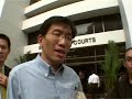 Charged for speaking in public without a permit