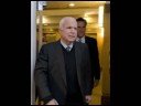 played to a slideshow of john mccain