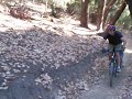 Downieville Darren at Demo forest jumping his trail a bike