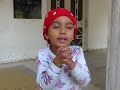 Pavneet standing on the steps of the gurdwara in her Nankey Pind- Jallandhar.