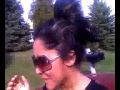 Snooki out the sunroof.