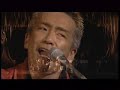 カリント工場の煙突の上に live 玉置浩二　koji tamaki