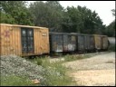 CSX SD80MAC and a Private Passenger Car on Q409