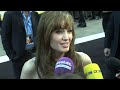 angelina jolie talks action-heroes vs stay-at-home mums in this exclsuive interview from the black carpet at the gala prmiere of salt. more movie interviews: www.lovefilm.com follow us: twitter.com