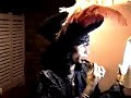 Steven Tyler of Aerosmith putting on Lipstick
