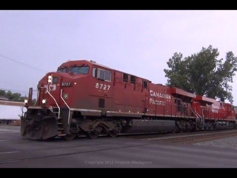 ES44AC - A CP Rail manifest seen at Chesterton/Porter, IN on a very rainy Wednesday in Summer 2012. Thanks for watching! Please comment, rate, and Subscribe! Copyrigh...