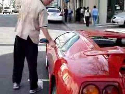VT - BrianZuk records a red Diablo VT pull up to valet, doors go up, passengers come out, then parks. Then when the driver leaves the vertical doors open again, i...