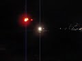 InterCity 77 going past Suhonen level crossing at night