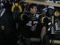 Corey Lynch, Kevin Richardson, and Armanti Edwards (holding the 2007 FCS championship trophy) leave the stadium in Chattanooga after winning their third straight national title.