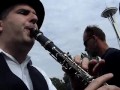 Before their Saturday performance on the 2007 Northwest Folklife Fountain Lawn Stage, Orkestar Zirkonium, a Balkan-style brass band based in Seattle WA, staged a little parade around the audience. www.orkestarzirkonium.com I just happened to be at the right place, at the right time to capture the event. This video is sponsored in part by Sanyo Energy USA - eneloop batteries designed for the active digital lifestyle.