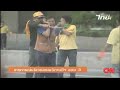 Anti-government protesters shoot at government supporters on a highway in Bangkok.