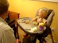 Madeline feeding herself