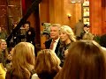 Regis Philbin and Kelly Ripa talking to the audience. Regis Philbin and Kelly Ripa talking to the audience.