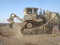 Armored D9 Dozer crushing cars in Iraq