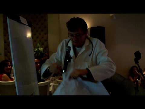 Joe Pasquale paints upside down for Rainbow Child Charity Dinner