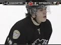 Alexander Ovechkin tries to hit Evgeni Malkin