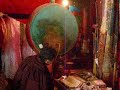 Monk Banging Drum in Samye Monastery Monk Banging Drum in Samye Monastery