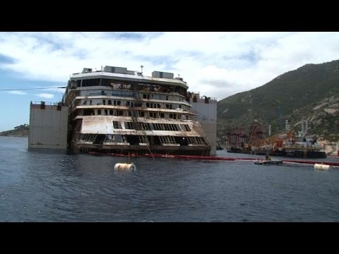View - Passengers who survived the Costa Concordia Cruise ship accident visit the shipwreck in the midst of the lifting operation. Duration: 00:52.