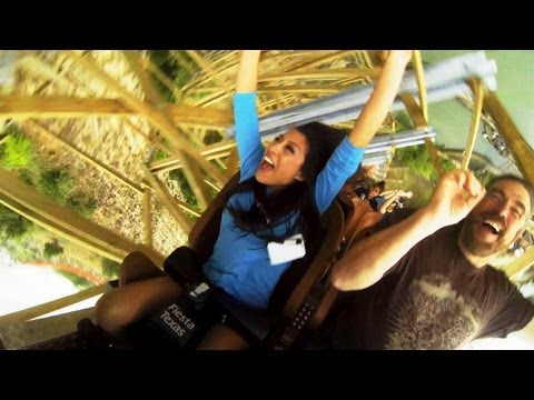 on ride - East Coast(er) General and a park guest take a ride in the front row of Iron Rattler, the new steel hybrid coaster at Six Flags Fiesta Texas. Like the New Te...