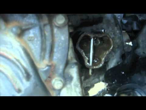how to remove drive axle from transmission