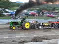 john deere tractor pulling in the enhanced class.... full pull !!

this is not a carbon neutral event, lol. the black smoke you see is the result of burning lots of diesel with some water/alcohol injection.