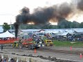 john deere tractor pulling in the enhanced class.... full pull !!

this is not a carbon neutral event, lol. the black smoke you see is the result of burning lots of diesel with some water/alcohol injection.