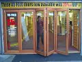 Vufold sliding folding doors in savoy timber Wigan showroom