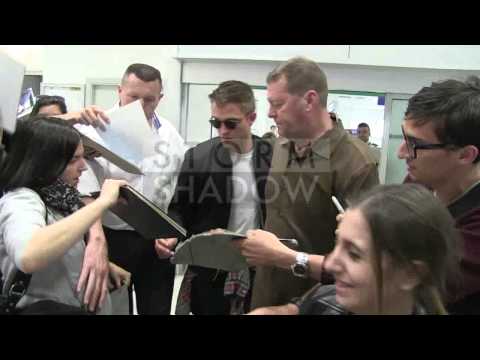 EXCLUSIVE: Robert Pattinson arriving in Cannes airport for the 2014 festival
