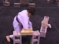 Karate women breaking bricks