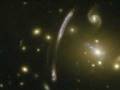videos de 'Comet Galaxy' Ripped Apart by Galaxy Cluster