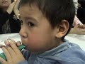 Funny - Kid having trouble blowing up a balloon - Part 2 Funny - Kid having trouble blowing up a balloon - Part 2