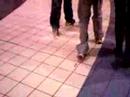 some kid with tp stuck to his shoe