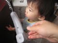 carina playing at dads desk