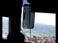 vovlo bus in india insde and seeing sea near road vovlo bus in india insde and seeing sea near road