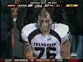 OU intercepts Graham Harrell. Ref gets friendly with an OU player.