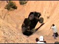 Jeep rolls down a rock Jeep rolls down a rock