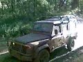 landrover defender extreme in bog hole at mount robertson
