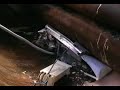 an automatic washing machine is crushed in a dennis phoenix xm garbage truck.  the victim is a hotpoint 9530....