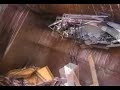 an automatic washing machine is crushed in a dennis phoenix xm garbage truck.  the victim is a hotpoint 9530....