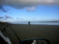 rmz450 wheelie down murawai beach in new zealand