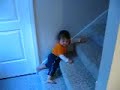 Chunky Monkey Boy slides down stairs with ease Chunky Monkey Boy slides down stairs with ease