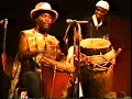 Vodou djaz rasin from FOULA - Recorded live in Haiti, in 1990.  The song Neg Kap Pote is based on the traditional rhythm of Petwo, masterfully performed here by Jean-Raymond Giglio & Bonga Jean-Baptiste.  Chico Boyers, (bass), Thurgot Theodat (sax & percussion), Tido Lavaud (guitar/lead vox) and Rasin (perc.) are also featured in this extremely rare live performance footage from one of the greatest underground bands in Haitian roots music history: FOULA.