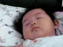 Smiling Wylene while SLEEPING!  (just watch 1st few seconds) 9/23/08