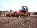 Pottinger 6 metre Synkro being pulled by a Cat Challenger 360 horsepower track machine