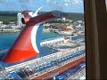 Navigator of the Seas docked next to the Carnival Holiday Navigator of the Seas docked next to the Carnival Holiday