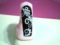 Nail art black and white scrolls and dots