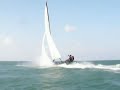 Righting a capsized catamaran (Hobie Cat speed) Righting a capsized catamaran (Hobie Cat speed)