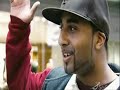 a version i uploaded that actually has sound. derren brown makes people at a shopping center stop and put their hand and arm in the air